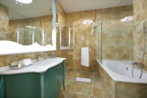 Our Luxury Rooms all offer a beautiful onyx bathroom with a separate shower and tub